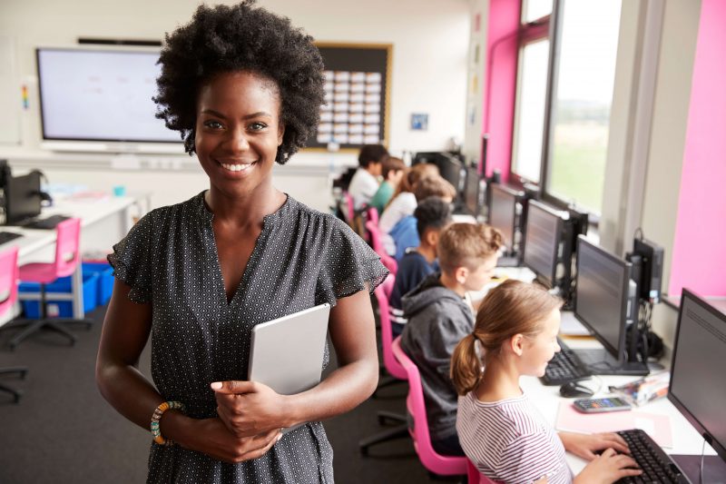 Schoolteacher and students